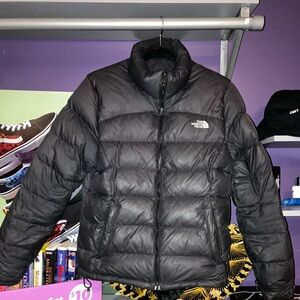 Gently used woman’s north face puffer jacket size medium.